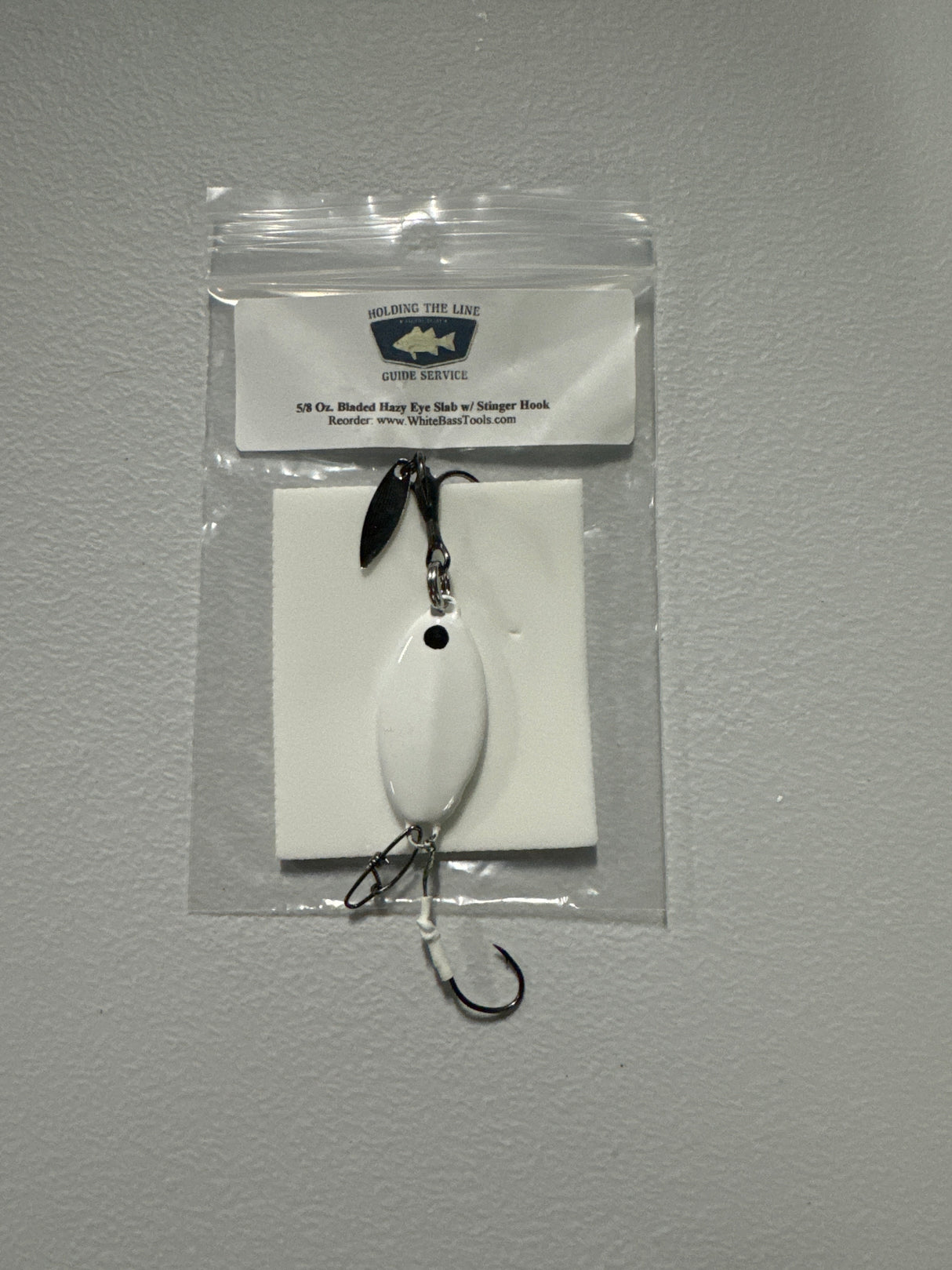 HOLDING THE LINE GUIDE SEVICE BLADED HAZY EYE W/ STINGER HOOK